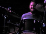 Chris Burris plays the drums